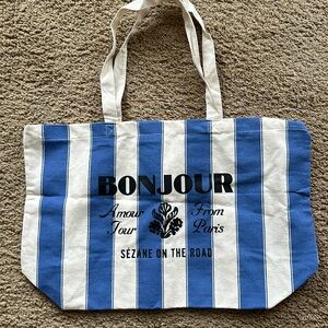 Sézane - Tote with Blue/ecru stripe. 100% cotton.